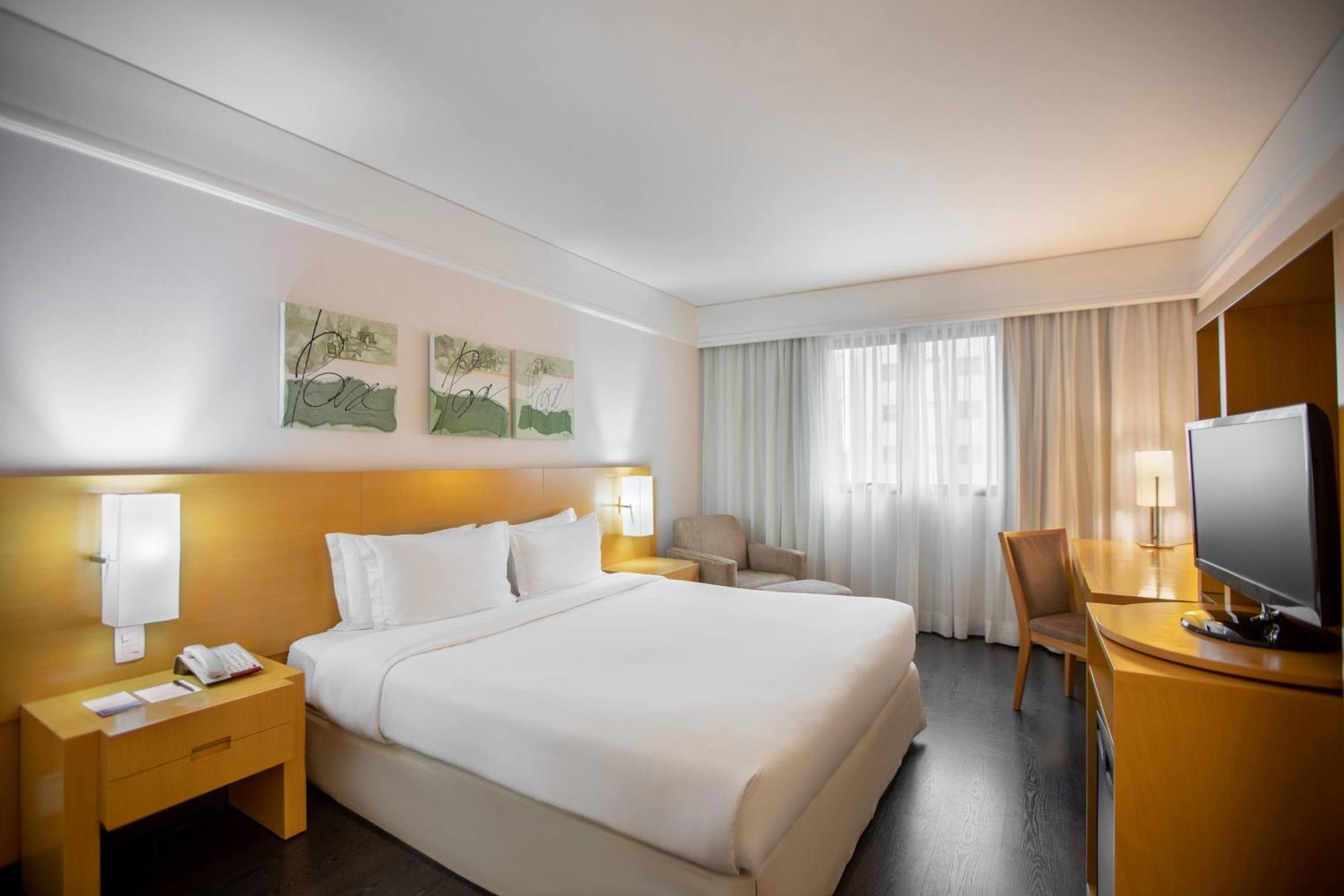Quarto Meliá com Cama Queen-size